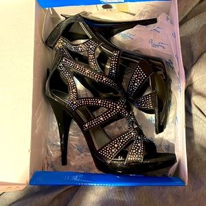 Brand new black sparkle platform heels.
